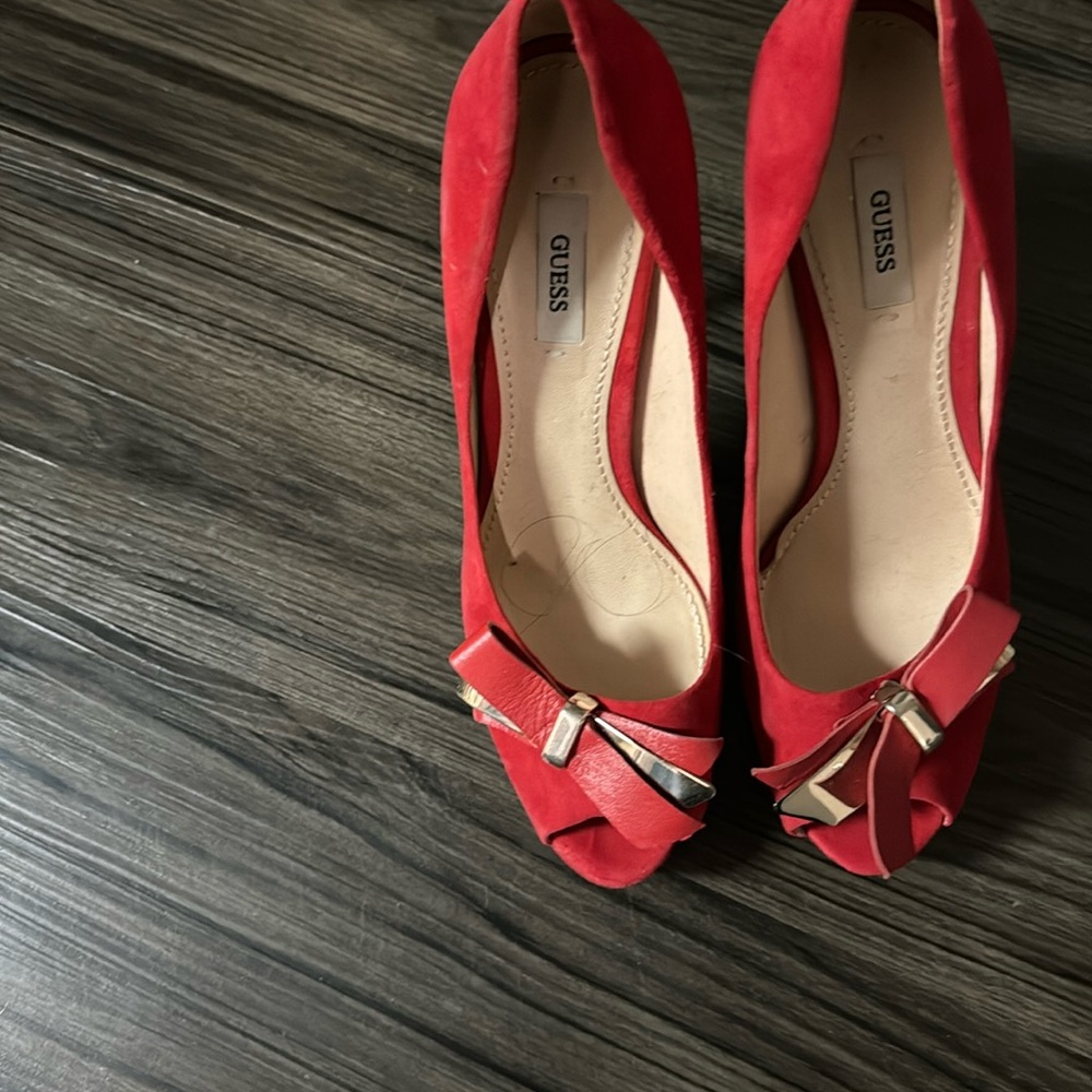 Worn 1 time. Sexy red & gold Guess platform heels.